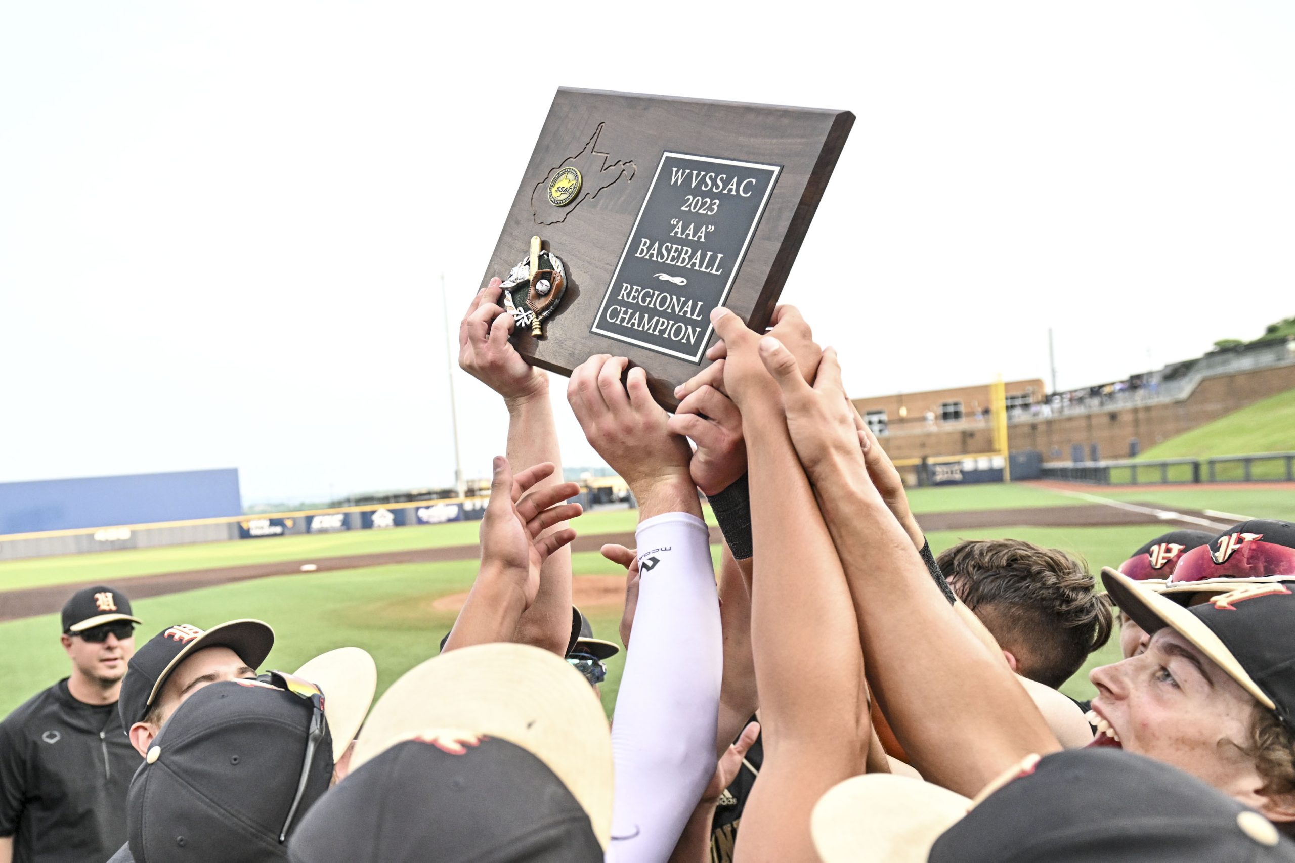 Hawks clinch regional series, state tournament spot with 13-8 win over Morgantown